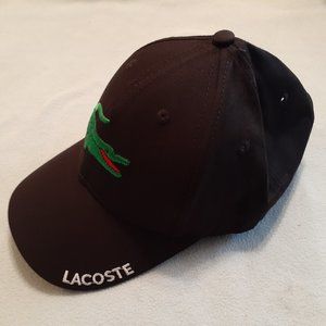 Lacoste one size fits all, with adjustable strap on the back, Black, NEW